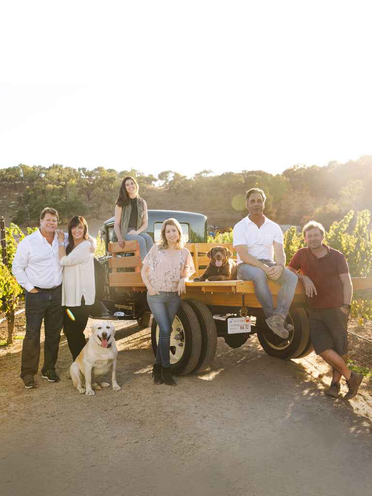 grieve family group photo in vineyard